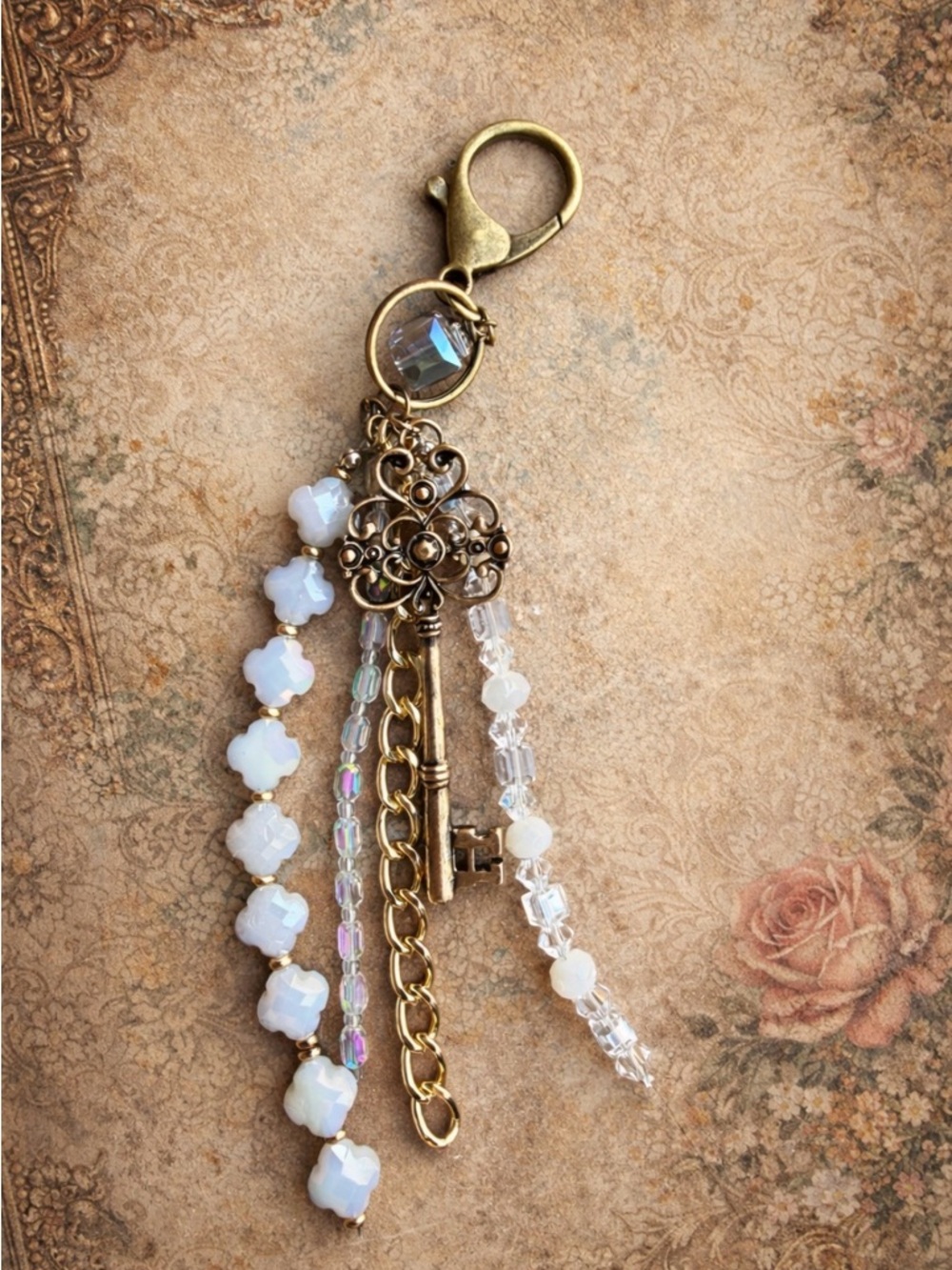 Vintage-Inspired White Bead Bag/Key Charm with Brass Key Accent